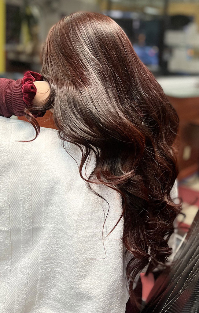 Woman’s haircut, color, and style