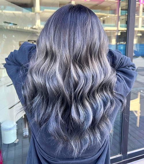 Woman’s haircut, color, and style